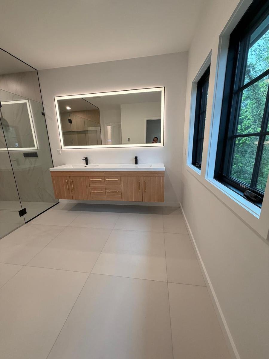 Floating vanity & LED mirror: post-construction cleaning by JF Spotless in Westchester County NY